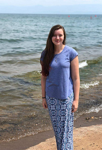 Megan McTaggart standing on a beach