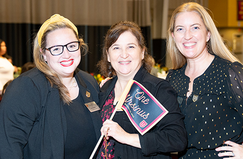 Ursinus staff (from l to r) KC Boyle, Maria CarosellaP'23, P'23, and Susan Fazio celebrate at inauguration.