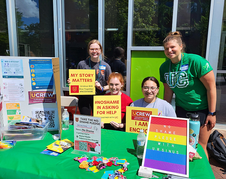 Ucrew Peer Educators tabling with their No Shame Pledge