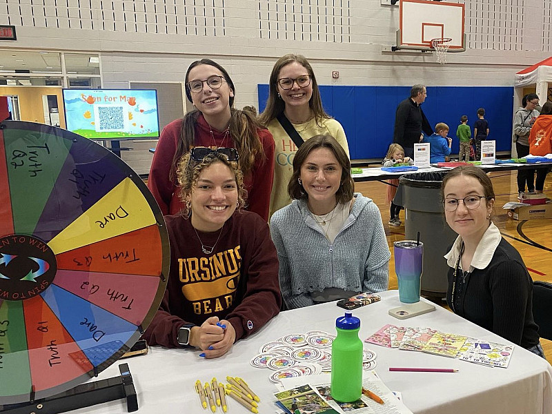 Ucrew students engage with community members at Elementary School Wellness Fair in Collegeville, PA
