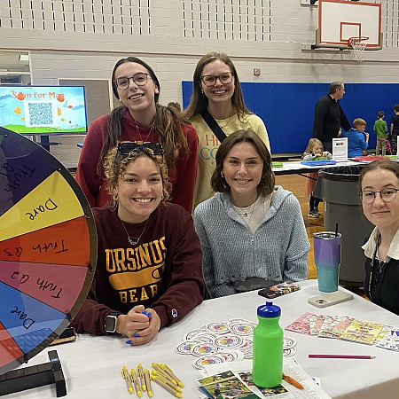 Ucrew tabling at elementary school wellness fair. Health and Promotion. Health Promotion events and candids Health Promotion events and c...