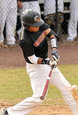 Ursinus Bears baseball player is about to hit baseball that was pitched by other team.