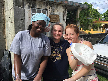 Cleaning up paint as SBP volunteers in Puerto Rico