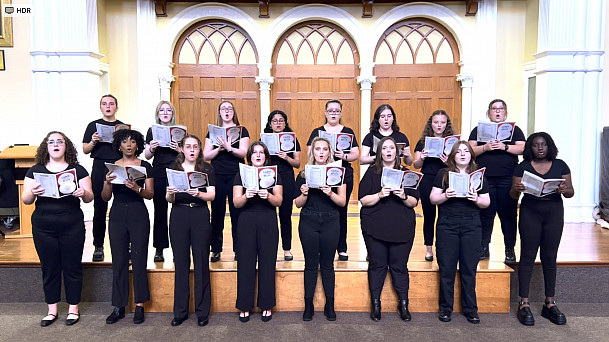 Ursinus College Singers rehearsing in Bomberger Hall Auditorium