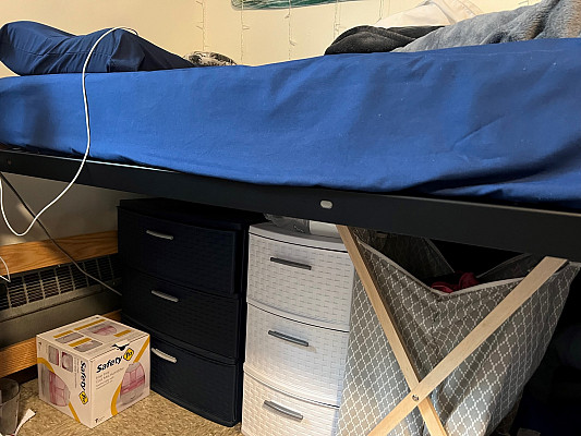 Bed height can go as high as 35-36 without separate bed risers. To be safe, storage furnishings should be roughly 33-24 max height.