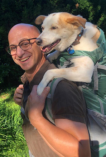 Photo of Prof. Domenick Scudera with his 2-legged dog, Lucky