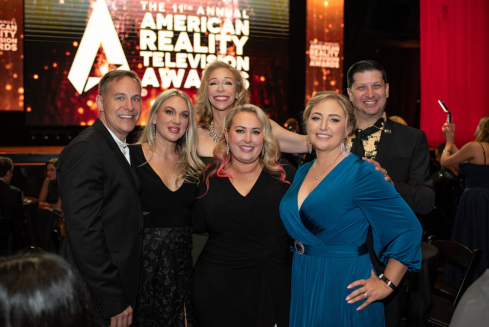 Group photo of the production and management team in Hollywood for an award ceremony.