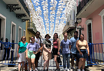 Associate Professor of Politics Rebecca Evans and the 2022 cohort of Melrose Fellows pose in Puerto Rico.