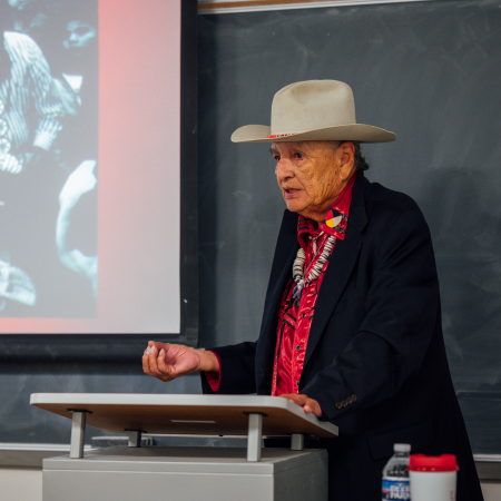 Elder John Thomas sharing a presentation on Boarding School to Activist to Elder