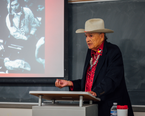 Elder John Thomas sharing a presentation on Boarding School to Activist to Elder