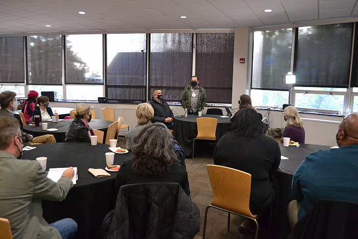 Assistant Chief Jeremy Johnson addresses faculty and staff.