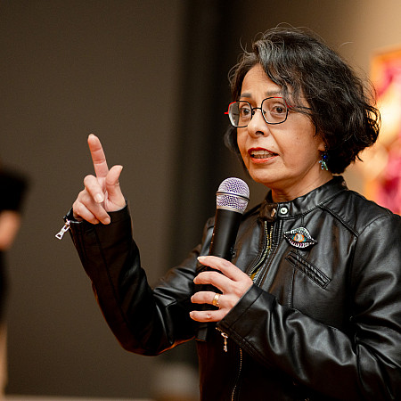 Kukuli Velarde speaking at her exhibition opening at the Berman.