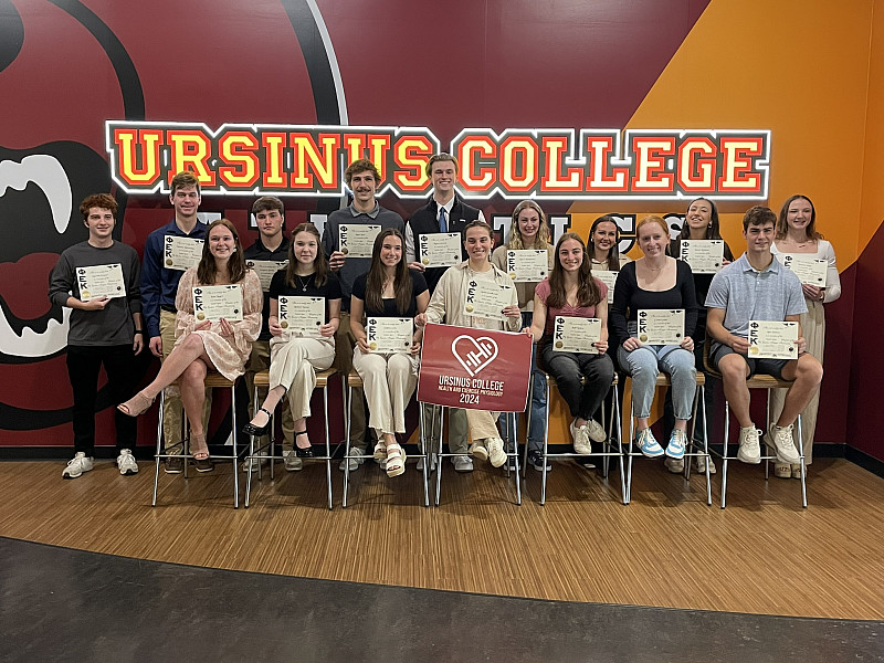 Health Science students celebrate their induction into Phi Epsilon Kappa, the department's academic honors society.