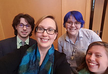 Prof. Throop and students pose for a fun picture after successfully presenting their work!