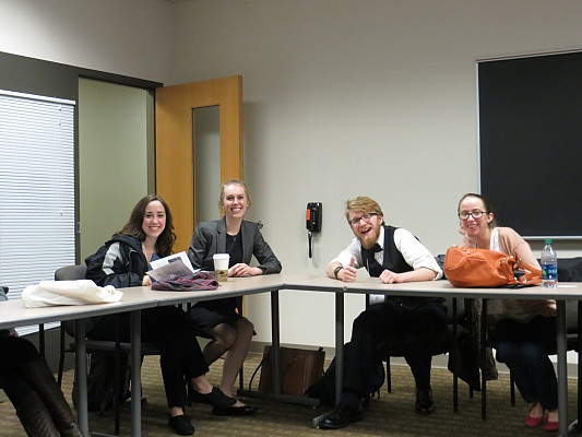 Faust, Biehl, Larese, and Geiger wait to hear Elijah Sloat ('18) present his work.