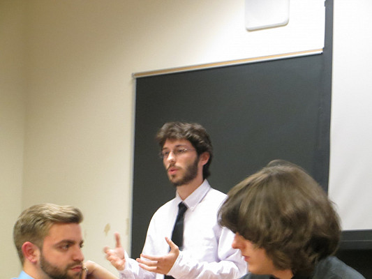 Elijah Sloat ('18) presents his work.
