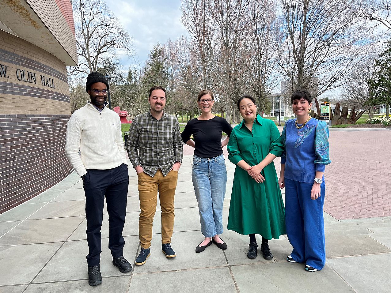 Photo of a group of the history professors standing together outside.