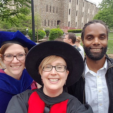 Dr. Daggar, Dr. Throop and Dr. Onaci celebrating at Commencement.