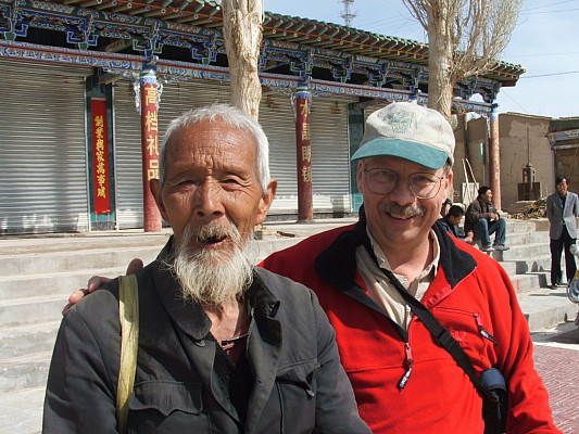 Dr. Hugh Clark (on the right) in Dunhuang, China