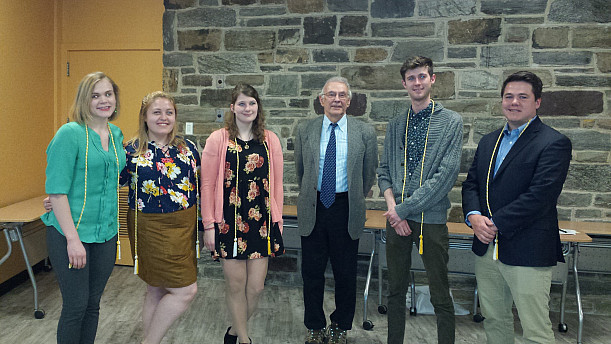 The German group show their academic pride. (From left, Kathryn Bormann, Hannah Engber, Sarah Wonsidler, Prof. Clouser, John (Zach) Runk, Brendan Werner)