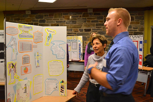 Shawn Caven discusses his unit plan with student teaching supervisor Carol Josel