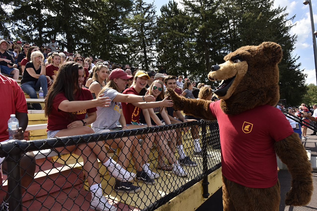 UC mascot handing out high fives