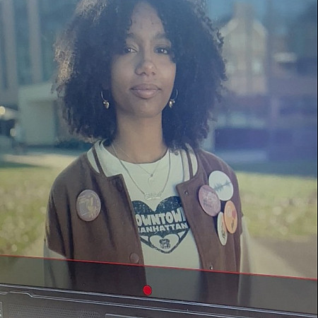 Featured student in front of IDC Our students both wonder and wander. Laisha '25 stepped up to help with production out front of the Innovation and Discovery Center.