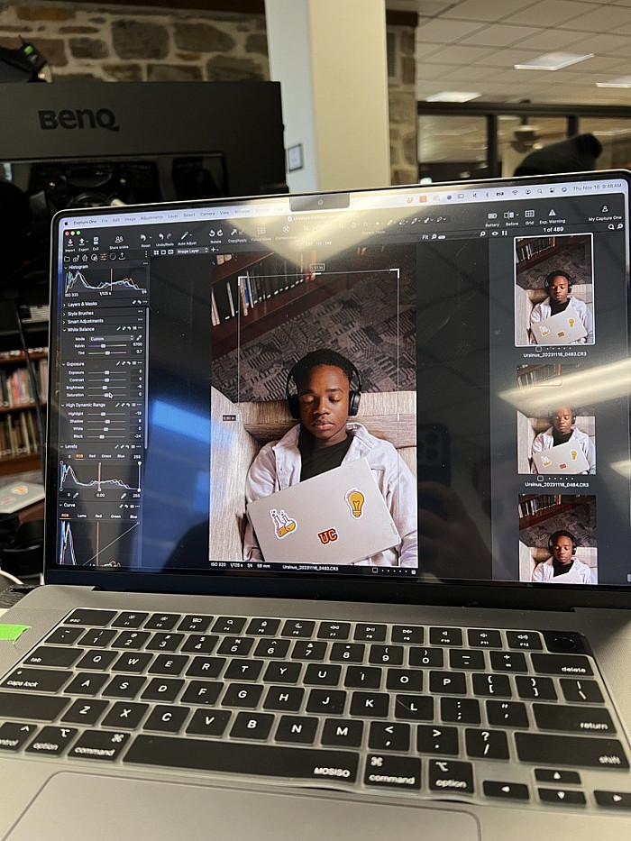 Sophomore Josh stepped in to help with a fun digital photo ad in Myrin Library entitled Open Your Mind.