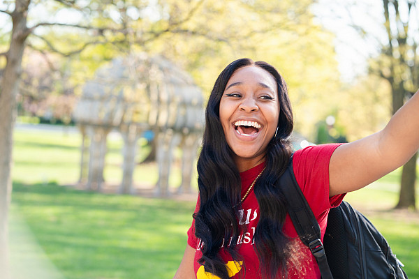 Te-ojah Dennison-Morgan '24 offers a welcoming smile across campus green.