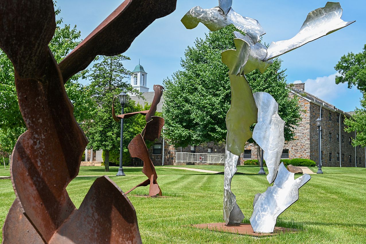 Dancers Sculpture up close with Reimert in background - Muse