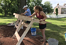 Neve Durrwachter '21 sifts through soil in search of artifacts at the Speaker's House in Trappe.