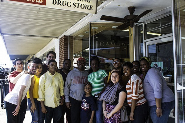The 2014 trip to Mississippi and Alabama in front of Stribling Drug Store in Philadelphia, Miss. Photo by Aaron Mitchell.