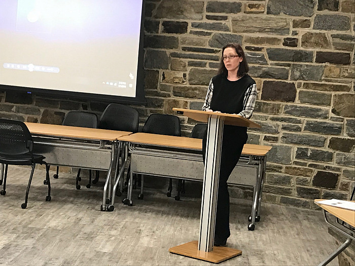 Professor Jennifer Stevenson speaks during a recent Day of Mourning event.