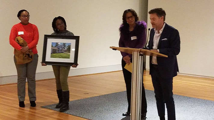 The event also honored Paulette Patton for her contributions. She was presented with a photo of Unity House.