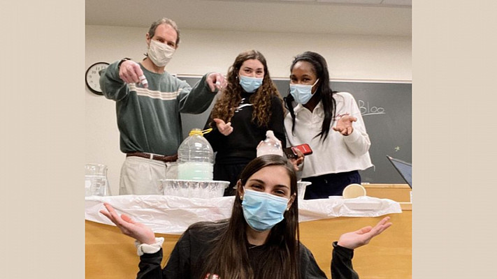 A science experiment with (back row) Professor Mark Ellison, Zenya Yanoff, Abigail Coachi and (front) Kathryn Bjorkund.