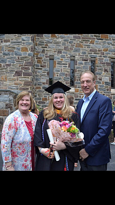 Sara Vukas and family posing at Ursinus College Commencement