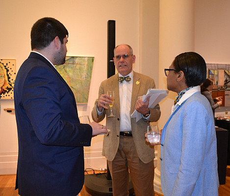 Dean Mark Schneider speaks at an event.