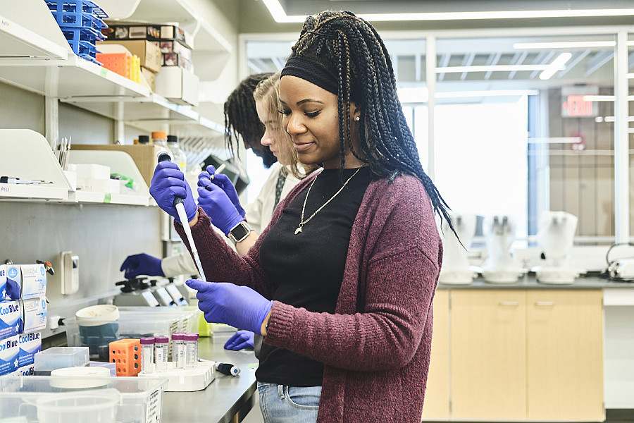 female student in neuroscience lab