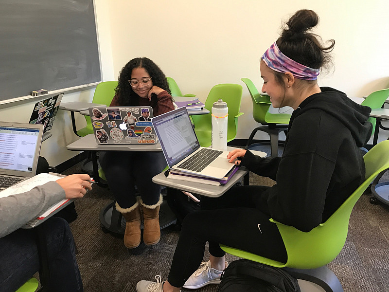 Writing Fellows giving each other feedback