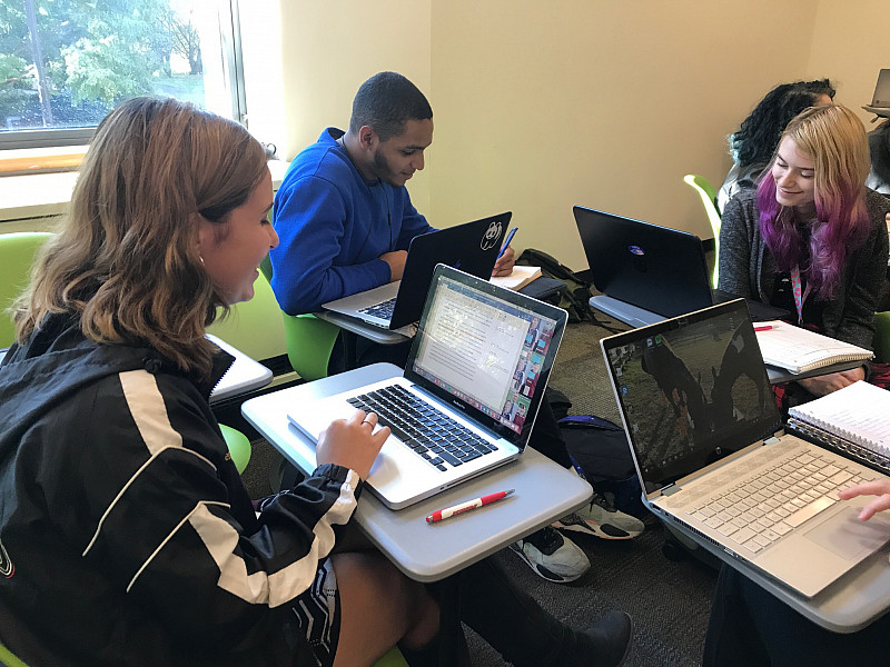 Writing Fellows practicing for the job
