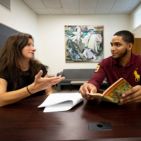 Talia and student talking candid