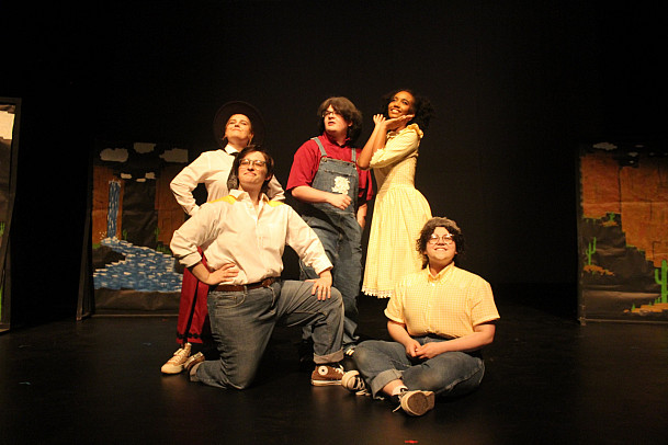 Photo of theatre students during a play performance.