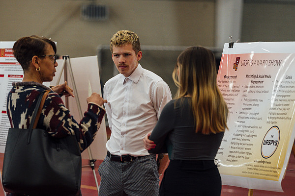 Media and communication studies students interested in marketing present their marketing plan and outcomes for a signature campus event, ...