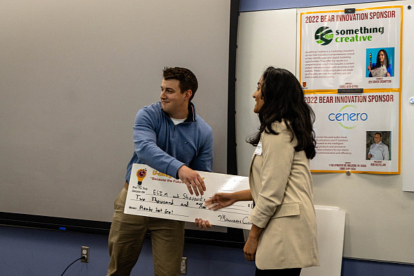 Judge Brandon Dowd with Mekha Varghese