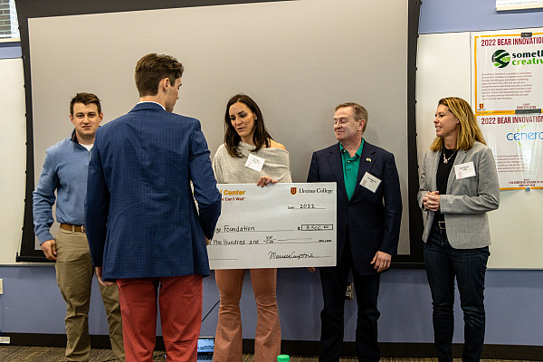 Trevor receiving his check for 1st Place