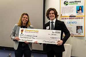 Connor Evangelisto '25 receving his check from Judge, Amy Pawloski